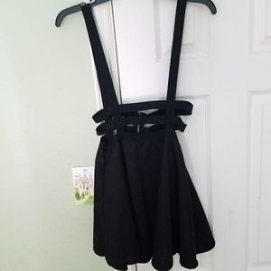 Black cage suspender skater skirt